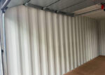 20-Fuß-Transportcontainer mit Garagen-Sektionaltoren – Bild 9